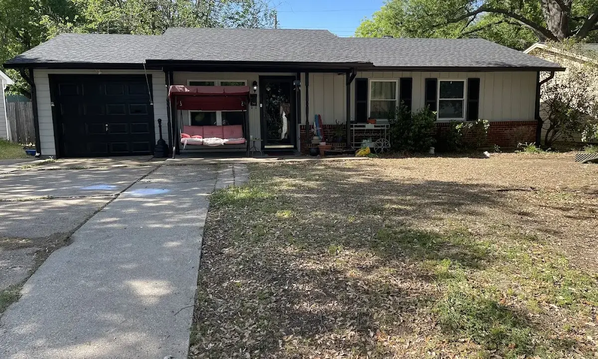 Asphalt Shingle Roof Repair crew at work on a residential roof in Polk City